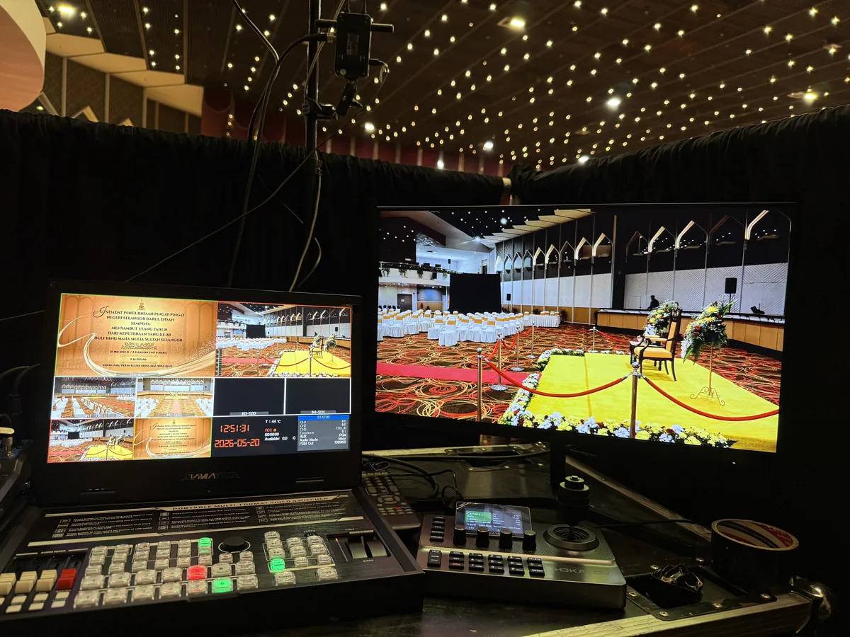 Video switcher and monitors showing a ceremony hall